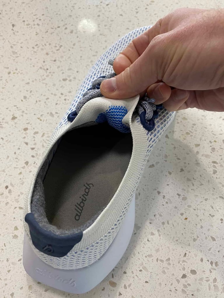 the knit upper on this running shoe is one piece – no tongue involved