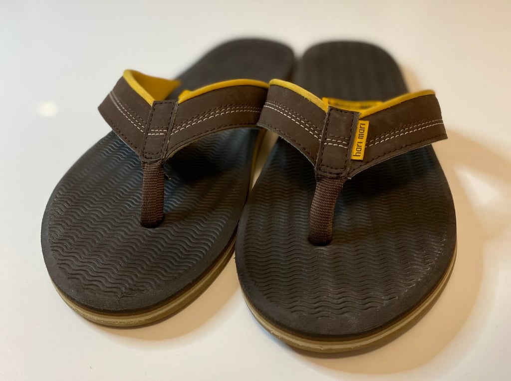 a pair of brown sandals