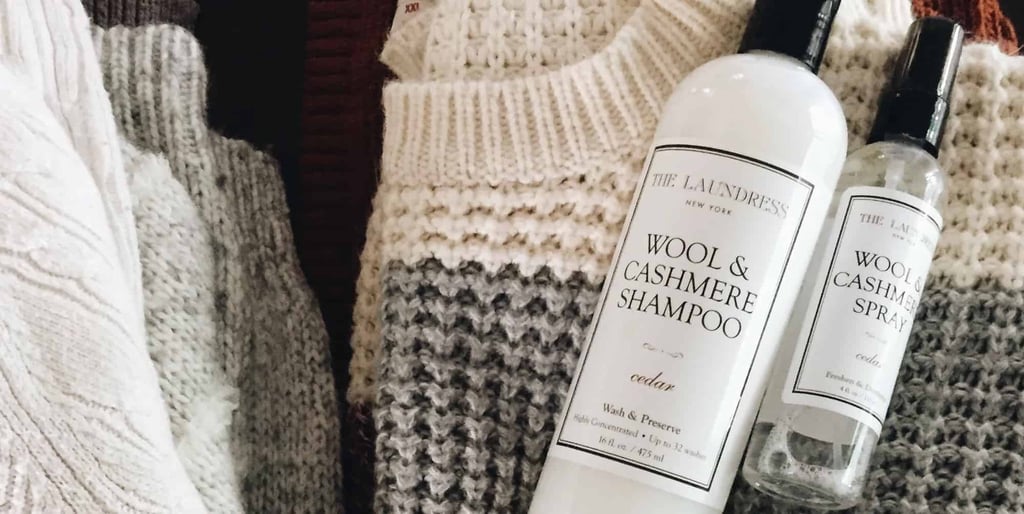 a bottle of shampoo and a sweater