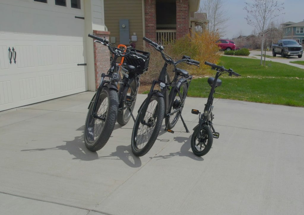 the rad rover (left, with the urrider kid seat), kbo breeze (middle), jetson folding ebike (right)