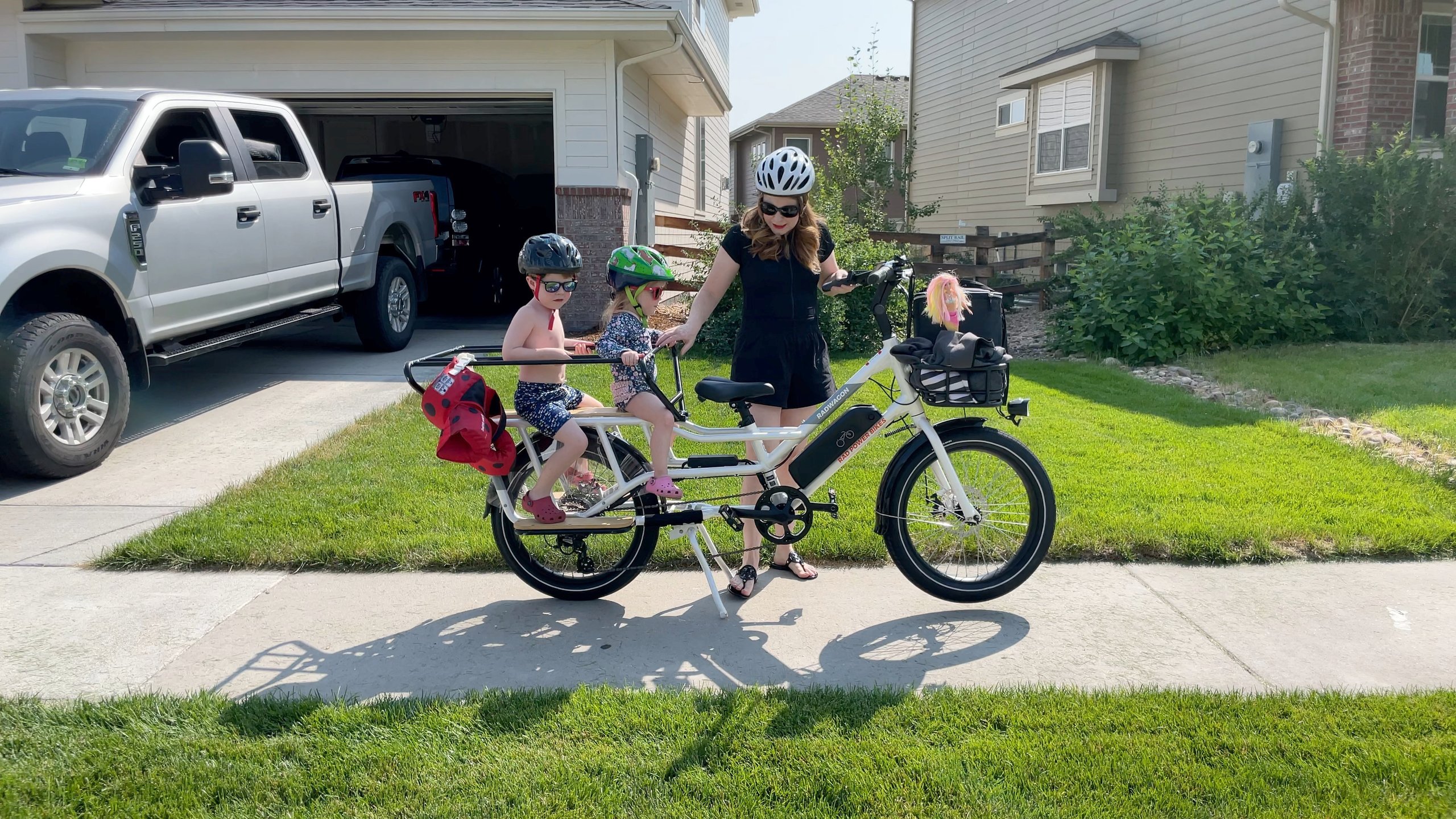 the kickstand is sturdy with two kiddos (and a mermaid) on the basket