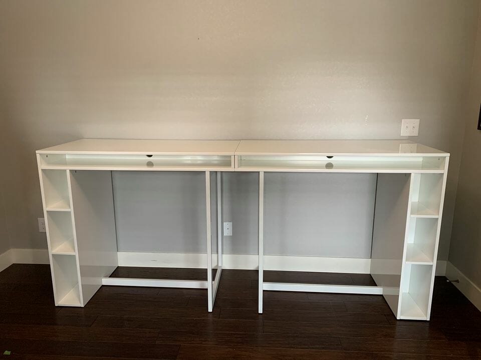 a white desk with shelves