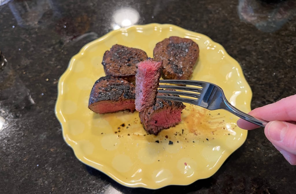 filet mignon shown in front – another filet and top sirloin shown behind
