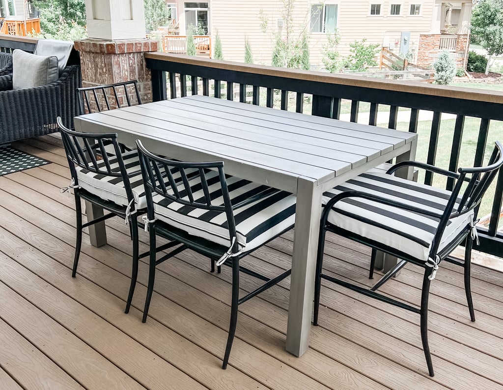 a table and chairs on a deck