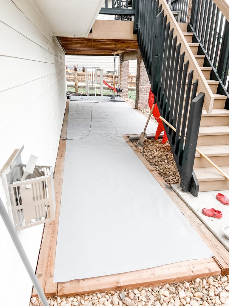 there is no floor (or deck planks) underneath – just rocks and landscaping fabric to help with noise