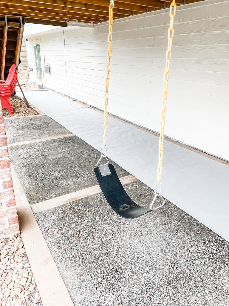 we used a heavy-duty landscape fabric – the plastic tiles alone would be very noisy and helps with regular maintenance