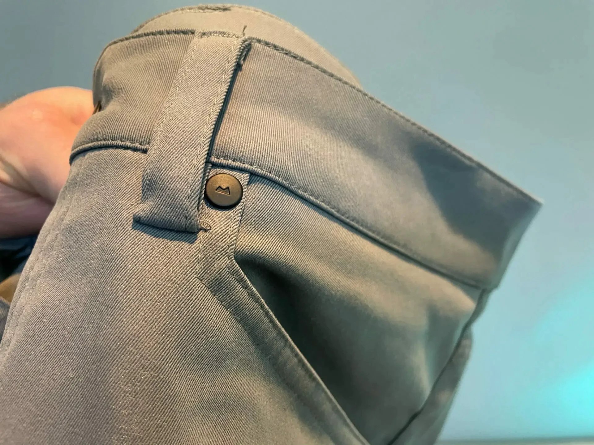 the myles button is the only logo on the myles tour pants