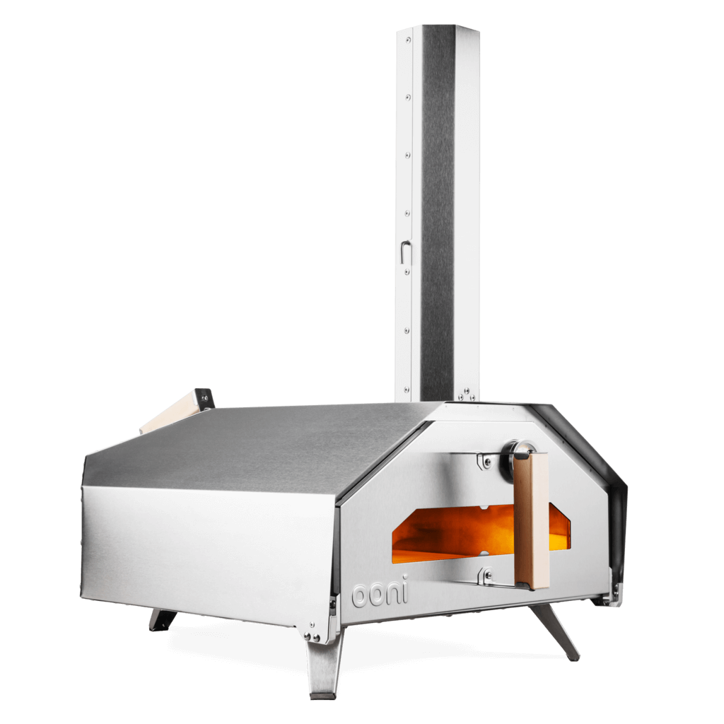 a silver pizza oven with a black background