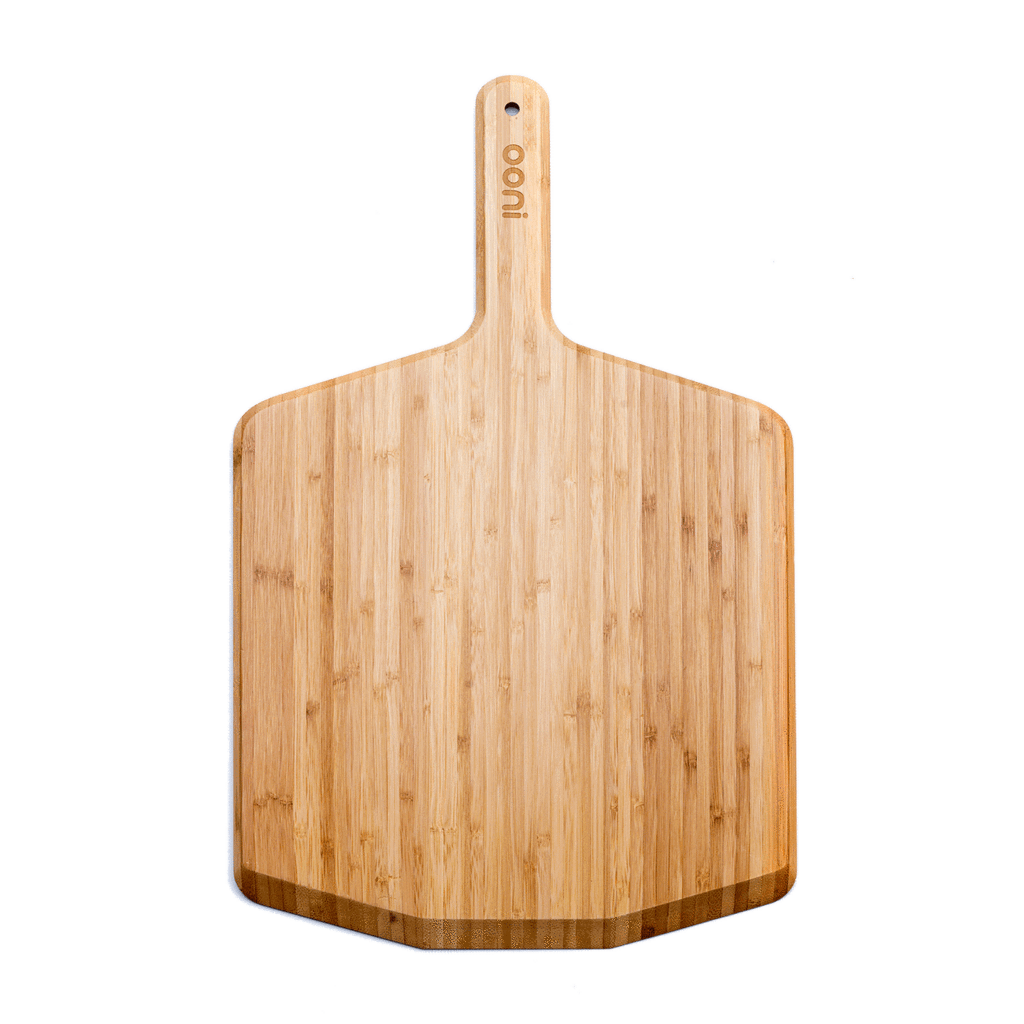 a wooden cutting board with handle