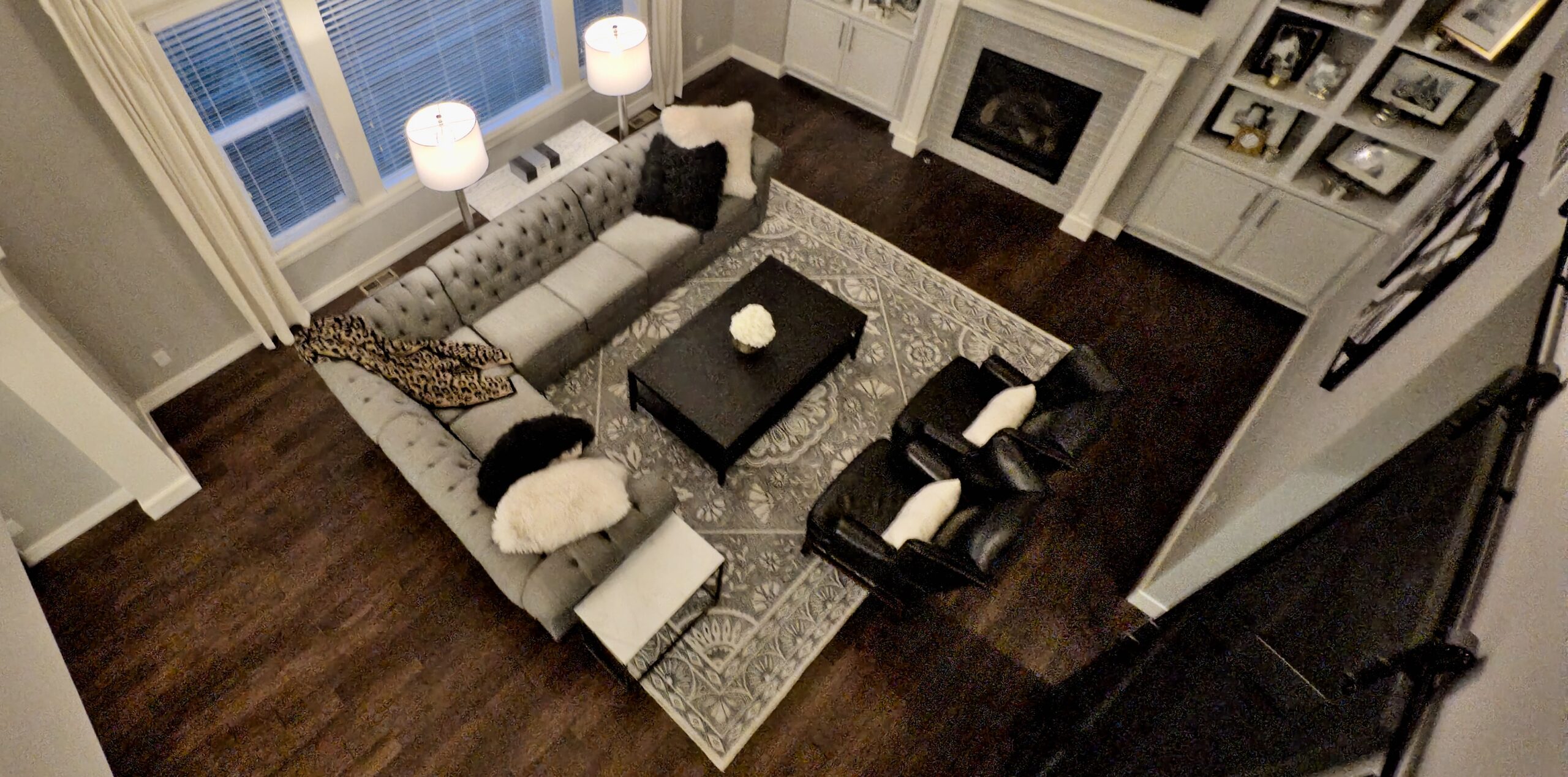 a living room with a fireplace and couches